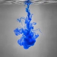 Blue ink blooming in water